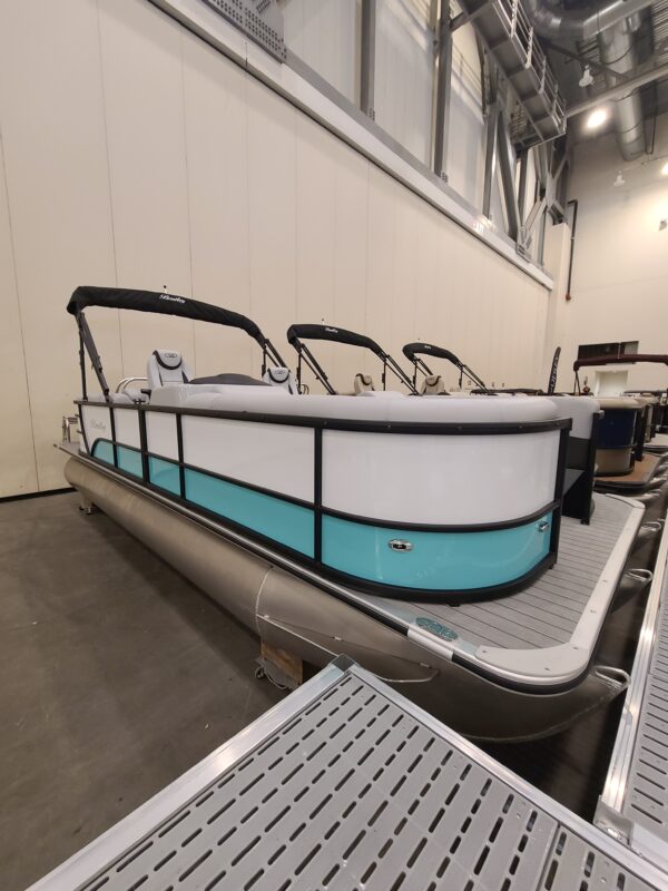 A boat with two seats on it in a room.