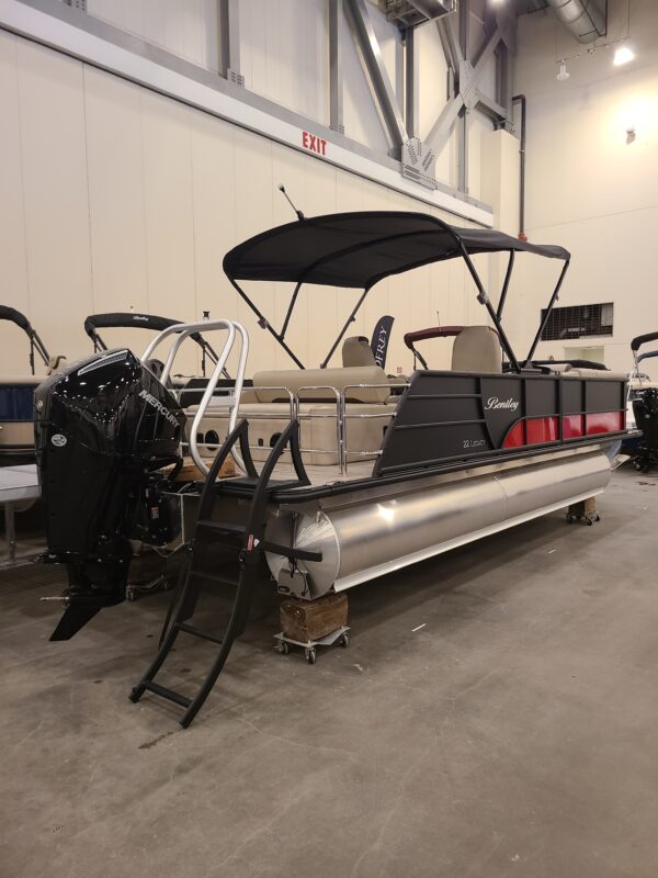 A boat is parked in the middle of a warehouse.