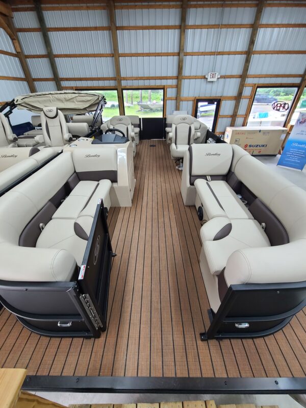 A boat with two couches and one table