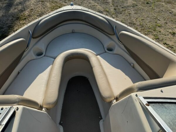 A boat with the seats folded down on it