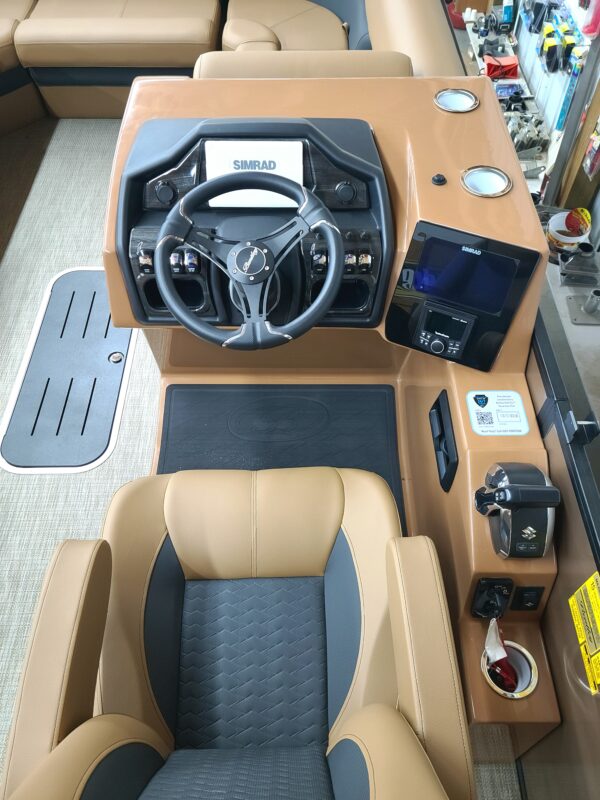 A boat with a steering wheel and controls.